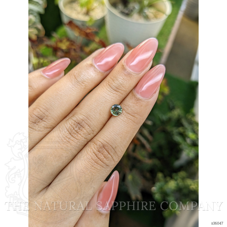 0.74 Ct. Yellowish Green Sapphire from Madagascar