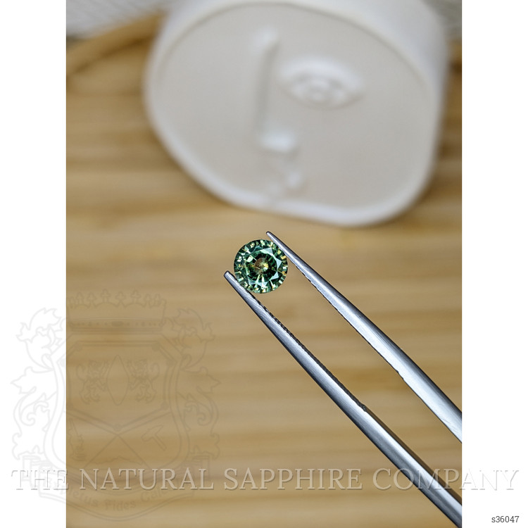 0.74 Ct. Yellowish Green Sapphire from Madagascar