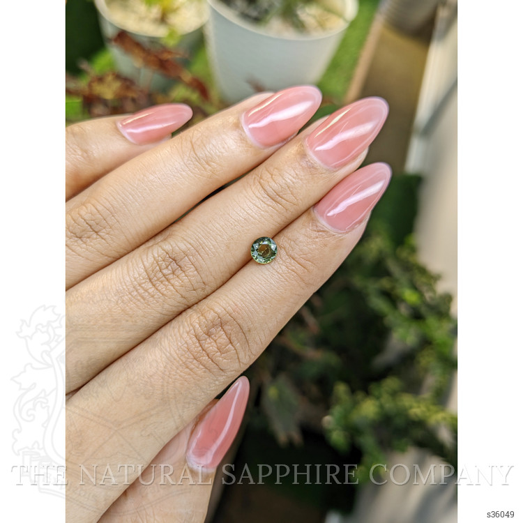 0.82 Ct. Yellowish Green Sapphire from Madagascar