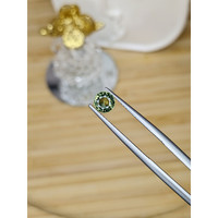 0.82 Ct. Yellowish Green Sapphire from Madagascar Life Style