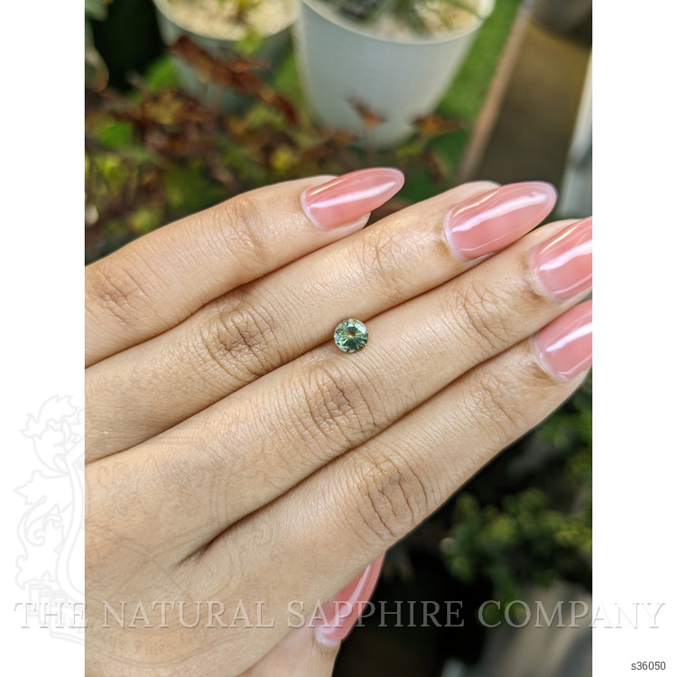 0.71 Ct. Yellowish Green Sapphire from Madagascar