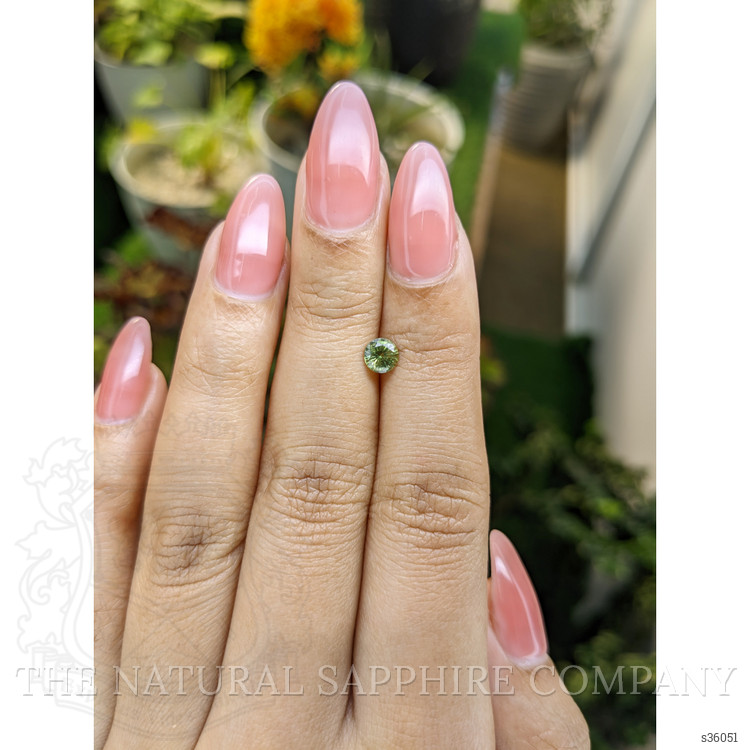 0.58 Ct. Yellowish Green Sapphire from Madagascar