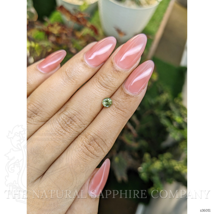 0.58 Ct. Yellowish Green Sapphire from Madagascar