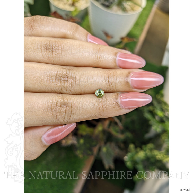 0.58 Ct. Yellowish Green Sapphire from Madagascar