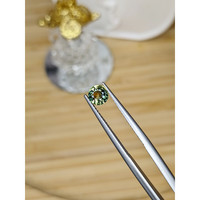 0.68 Ct. Yellowish Green Sapphire from Madagascar Life Style