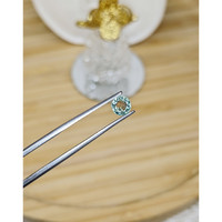 0.64 Ct. Green Sapphire from Madagascar Life Style