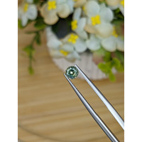 0.53 Ct. Bluish Green Sapphire from Madagascar Life Style