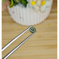 0.81 Ct. Green Sapphire from Madagascar Life Style