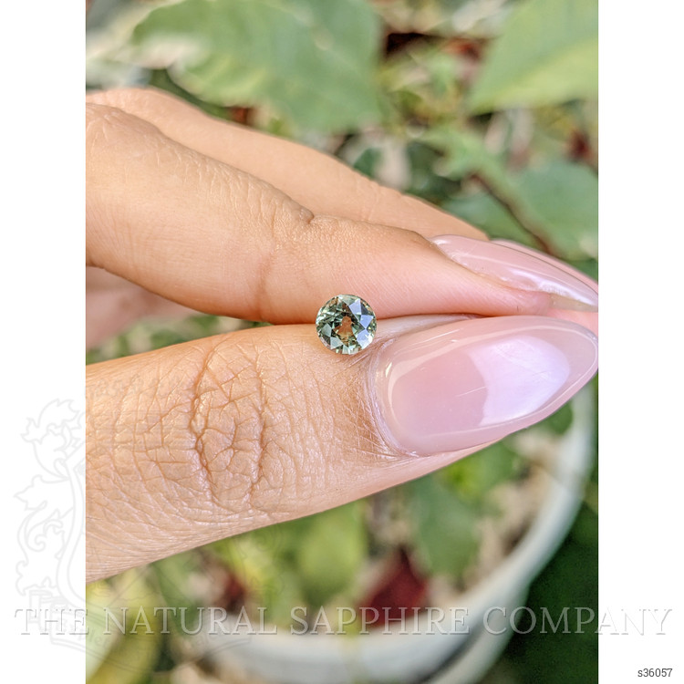 0.88 Ct. Yellowish Green Sapphire from Madagascar