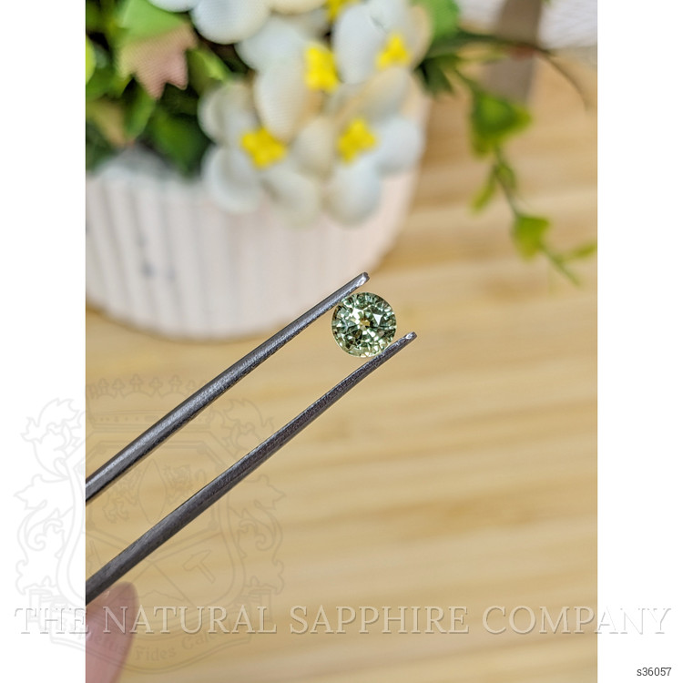 0.88 Ct. Yellowish Green Sapphire from Madagascar