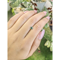 0.69 Ct. Yellowish Green Sapphire from Madagascar Life Style