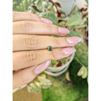 0.76 Ct. Green Sapphire from Madagascar Life Style