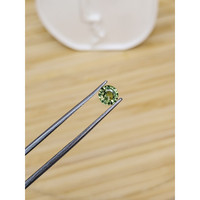 0.81 Ct. Yellowish Green Sapphire from Madagascar Life Style