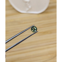 0.76 Ct. Yellowish Green Sapphire from Madagascar Life Style