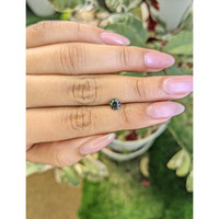 0.76 Ct. Yellowish Green Sapphire from Madagascar Life Style