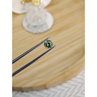 0.66 Ct. Green Sapphire from Madagascar Life Style
