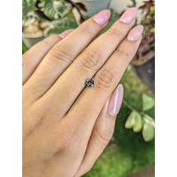 0.77 Ct. Green Sapphire from Madagascar Life Style