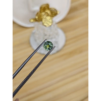 0.77 Ct. Green Sapphire from Madagascar Life Style
