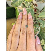 0.84 Ct. Green Sapphire from Madagascar Life Style