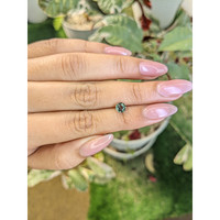 0.84 Ct. Green Sapphire from Madagascar Life Style