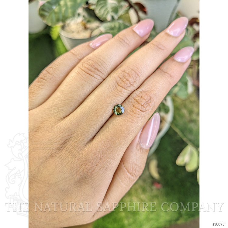 0.87 Ct. Yellowish Green Sapphire from Madagascar