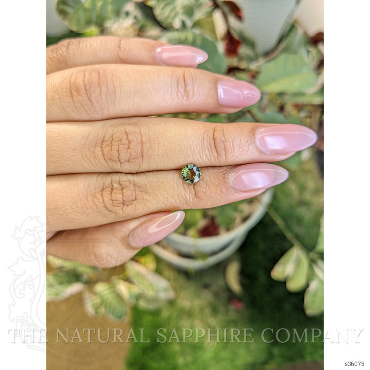 0.87 Ct. Yellowish Green Sapphire from Madagascar