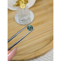 0.77 Ct. Bluish Green Sapphire from Madagascar Life Style