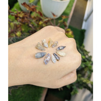 27.40 Ct. Multi Color Rough Sapphire from Ceylon (Sri Lanka) Life Style