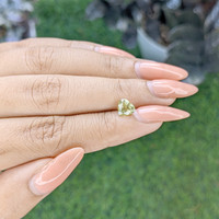 1.05 Ct. Yellowish Green Sapphire from Ceylon (Sri Lanka) Life Style