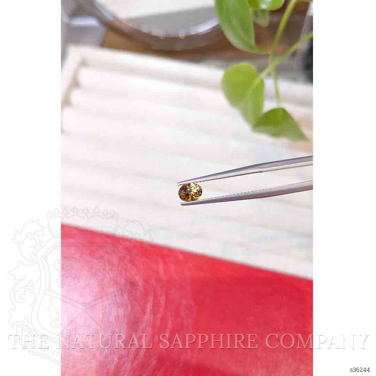 0.59 Ct. Yellowish Orange Sapphire from Montana