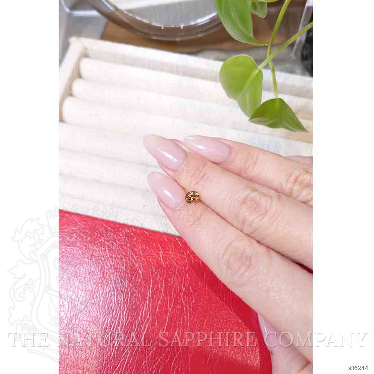 0.59 Ct. Yellowish Orange Sapphire from Montana