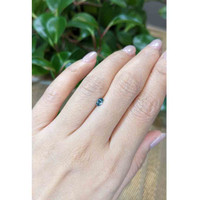 0.24 Ct. Greyish Blue Sapphire from Montana Life Style
