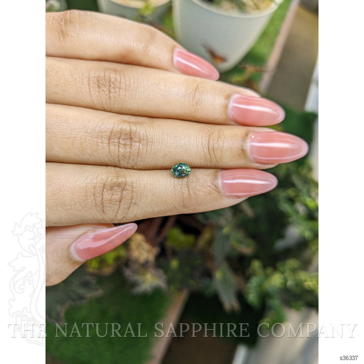 0.88 Ct. Yellowish Green Sapphire from Madagascar