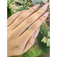 0.56 Ct. Green Sapphire from Madagascar Life Style