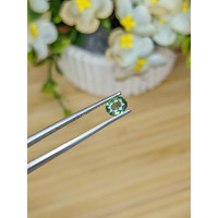 0.56 Ct. Green Sapphire from Madagascar Life Style