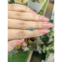 1.08 Ct. Bluish Green Sapphire from Madagascar Life Style