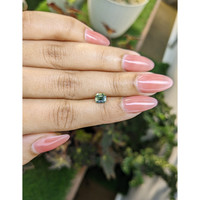 1.24 Ct. Yellowish Green Sapphire from Madagascar Life Style