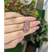 50.07 Ct. Purplish Pink Rough Sapphire Crystal from Ceylon (Sri Lanka) Life Style