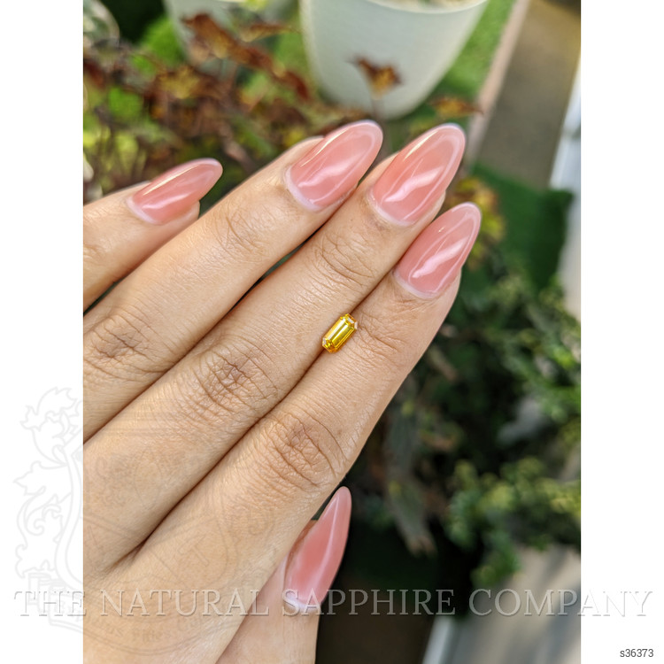 0.61 Ct. Yellowish Orange Sapphire from Ceylon (Sri Lanka)