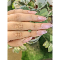 0.74 Ct. Yellowish Green Sapphire from Madagascar Life Style