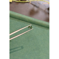 1.47 Ct. Yellowish Green Sapphire from Madagascar Life Style
