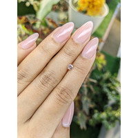 0.35 Ct. Peach Sapphire from Ceylon (Sri Lanka) Life Style