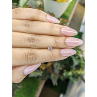 0.35 Ct. Peach Sapphire from Ceylon (Sri Lanka) Life Style