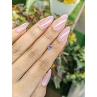 0.46 Ct. Pinkish Purple Sapphire from Ceylon (Sri Lanka) Life Style