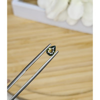 0.60 Ct. Yellowish Green Sapphire from Madagascar Life Style