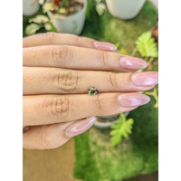 0.60 Ct. Yellowish Green Sapphire from Madagascar Life Style