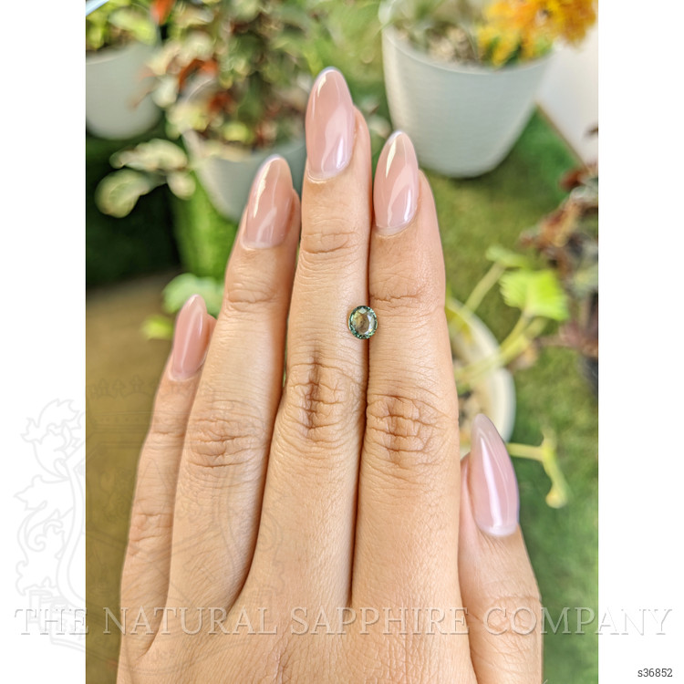 0.75 Ct. Yellowish Green Sapphire from Madagascar