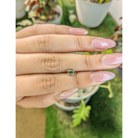 0.75 Ct. Yellowish Green Sapphire from Madagascar Life Style