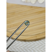 0.71 Ct. Green Sapphire from Madagascar Life Style