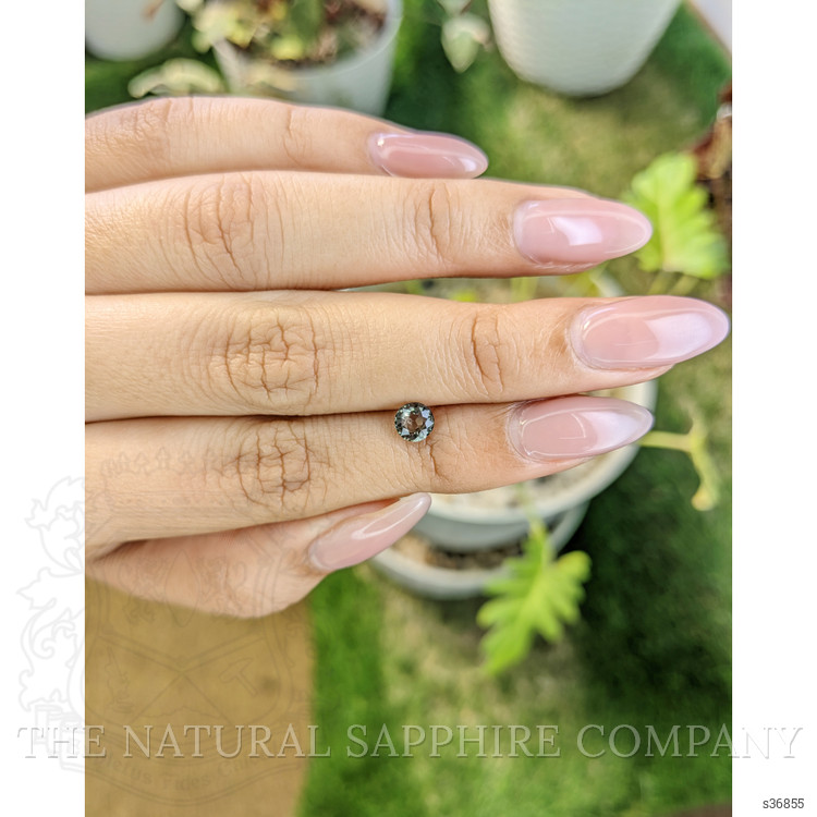 0.73 Ct. Brownish Green Sapphire from Madagascar